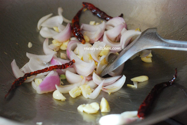 Add Onions, Garlic, Ginger And Dried Chilies